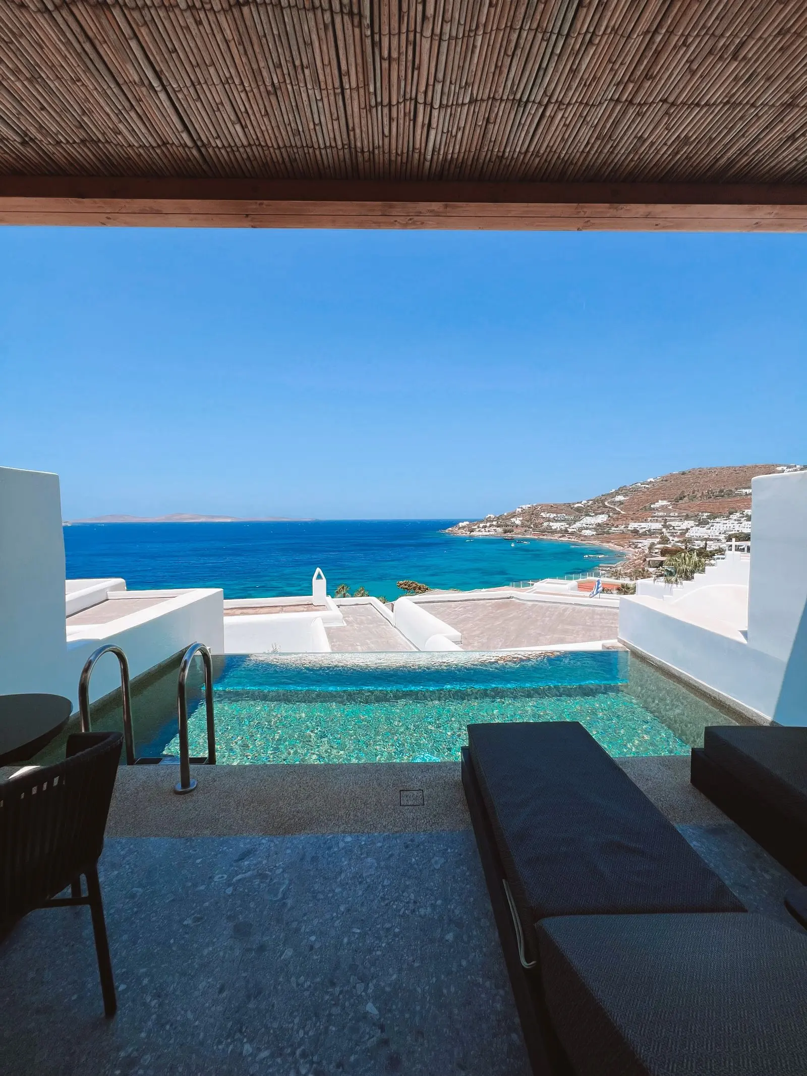 A pool terrace looking out to the sea